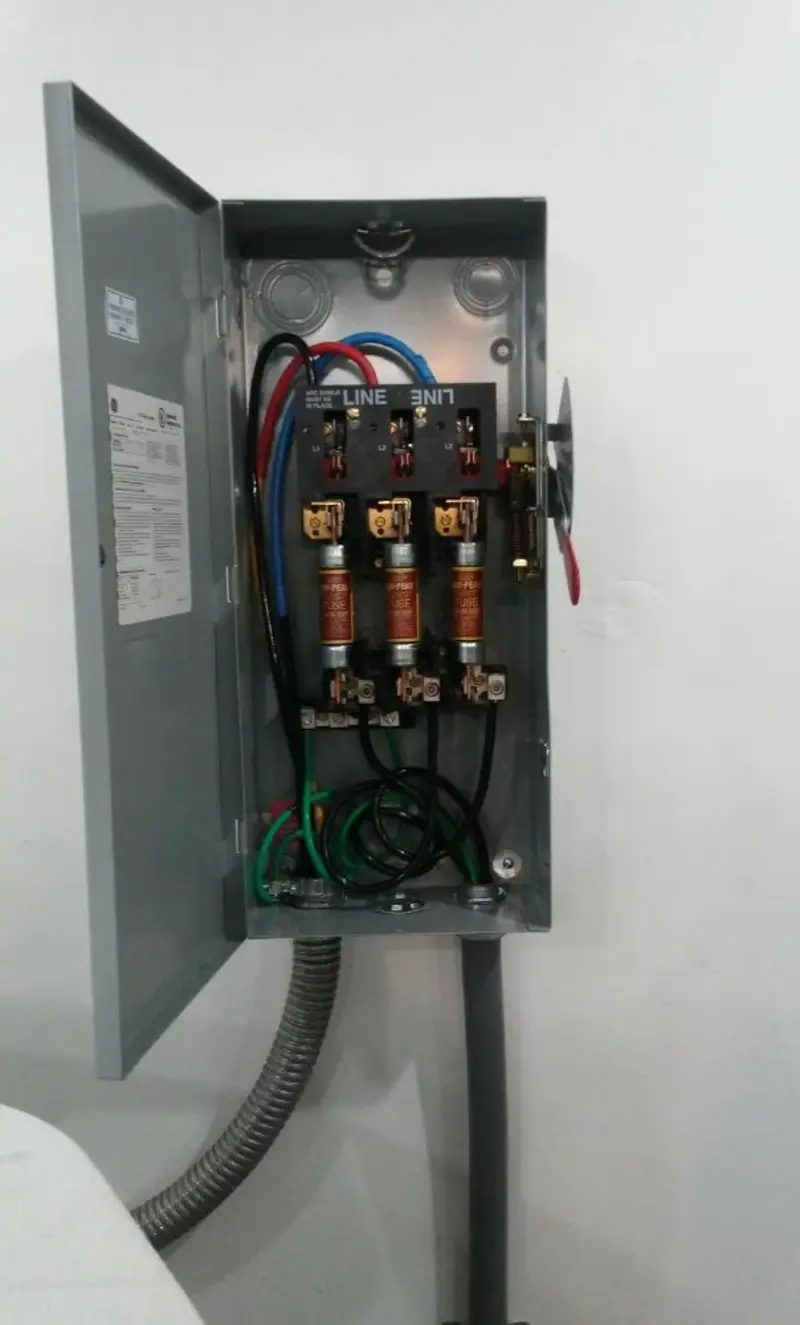 Three-phase disconnect switch installed for Smoke Detector Installation in Coconut Creek